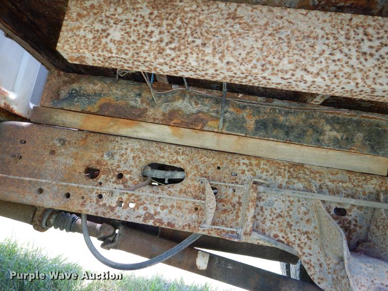 image for item DE1755 2004 Ford F350 Super Duty XL Crew Cab dump flatbed pickup truck