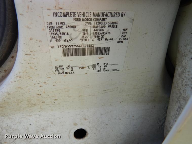 image for item DE1755 2004 Ford F350 Super Duty XL Crew Cab dump flatbed pickup truck