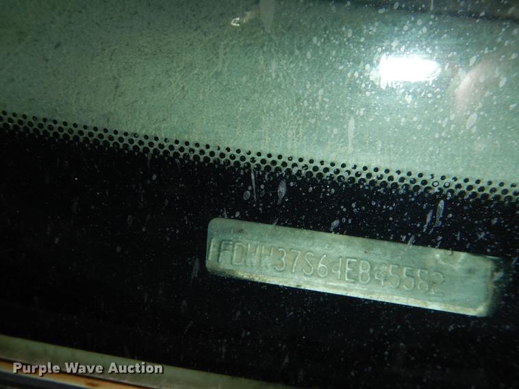 image for item DE1755 2004 Ford F350 Super Duty XL Crew Cab dump flatbed pickup truck