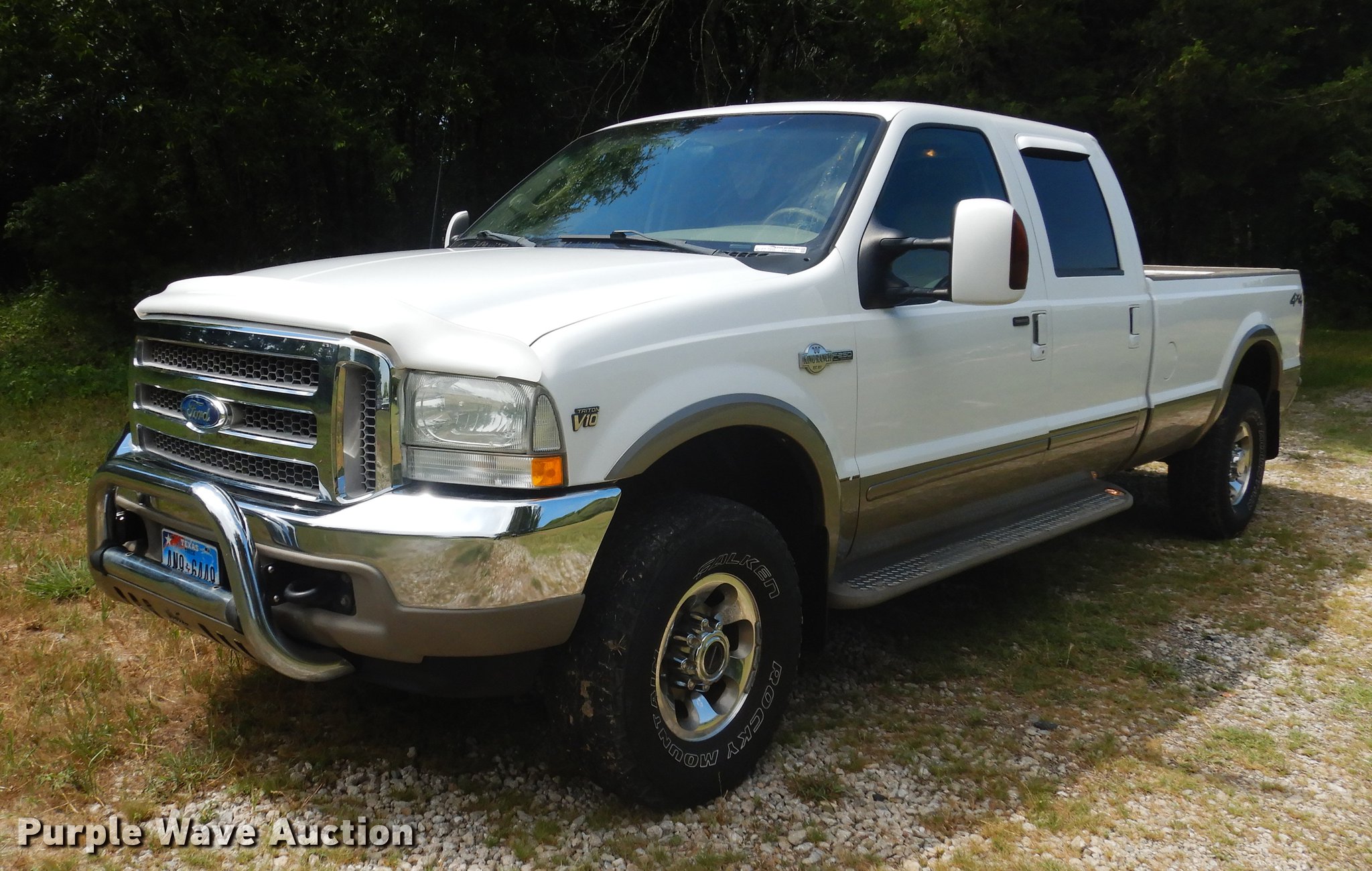2003 Ford F250 Super Duty King Ranch Crew Cab pickup truck in
