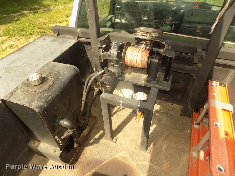 image for item DB8731 2000 Ford F650 Super Duty XL cable placer bucket truck