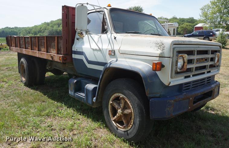 image for item DD7675 1983 GMC TopKick 7000 dump flatbed truck