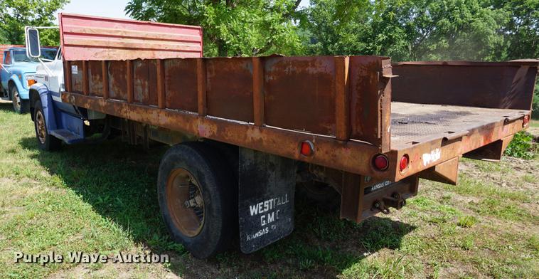 image for item DD7675 1983 GMC TopKick 7000 dump flatbed truck