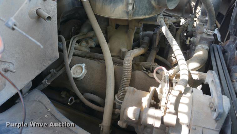 image for item DD7675 1983 GMC TopKick 7000 dump flatbed truck