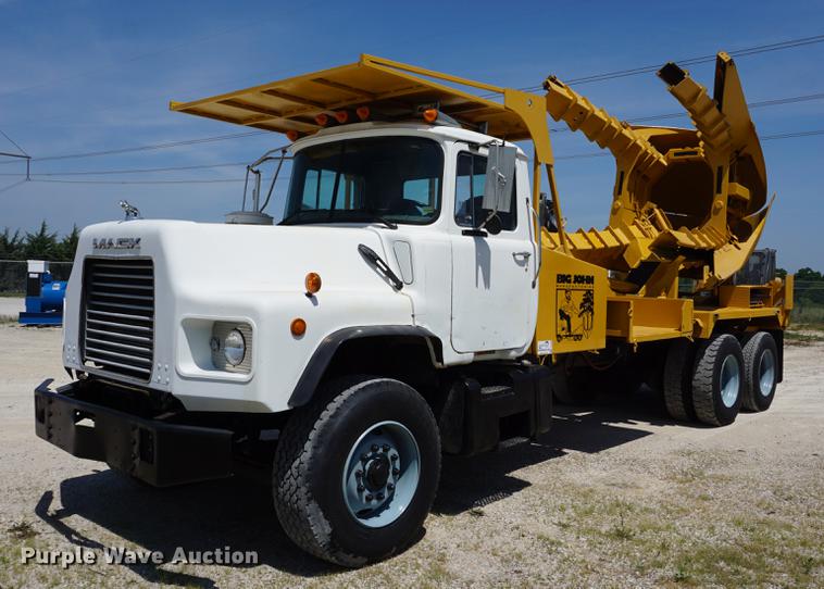 image for item DD7684 1998 Mack DM690S truck with Big John tree spade