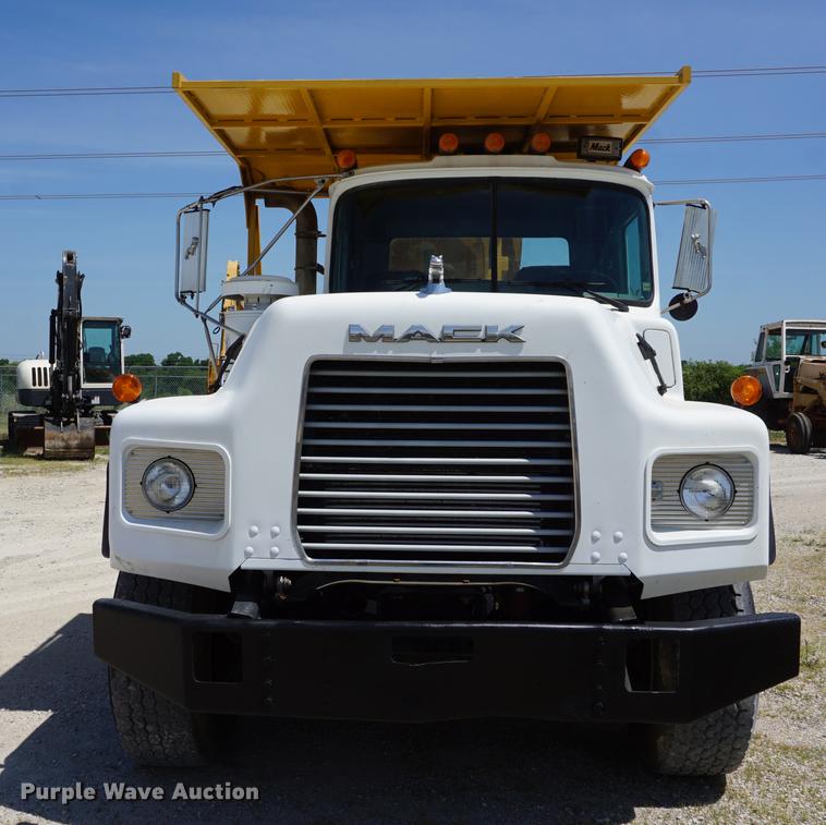 image for item DD7684 1998 Mack DM690S truck with Big John tree spade