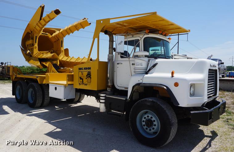 image for item DD7684 1998 Mack DM690S truck with Big John tree spade