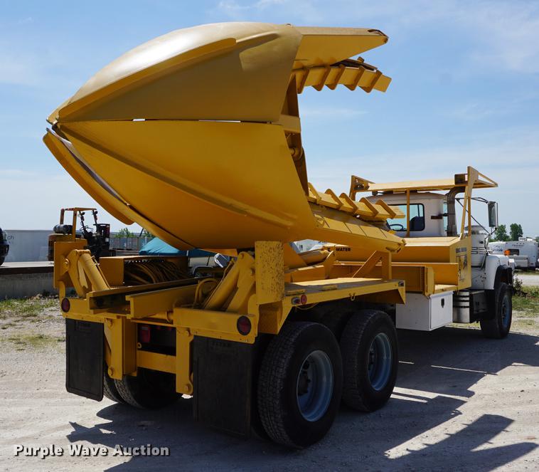 image for item DD7684 1998 Mack DM690S truck with Big John tree spade