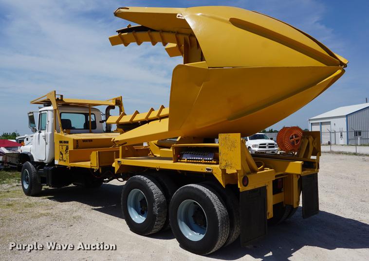image for item DD7684 1998 Mack DM690S truck with Big John tree spade