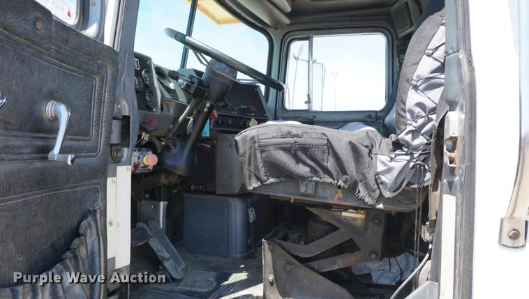 image for item DD7684 1998 Mack DM690S truck with Big John tree spade