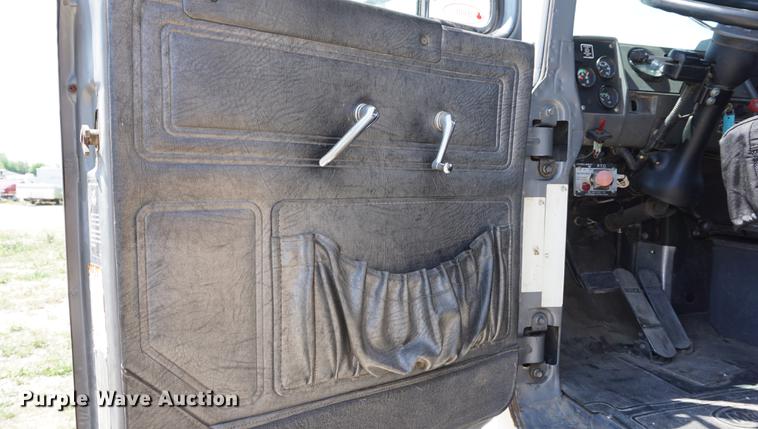 image for item DD7684 1998 Mack DM690S truck with Big John tree spade