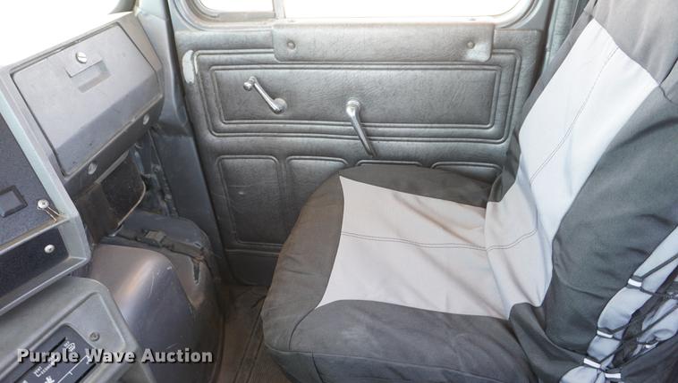 image for item DD7684 1998 Mack DM690S truck with Big John tree spade