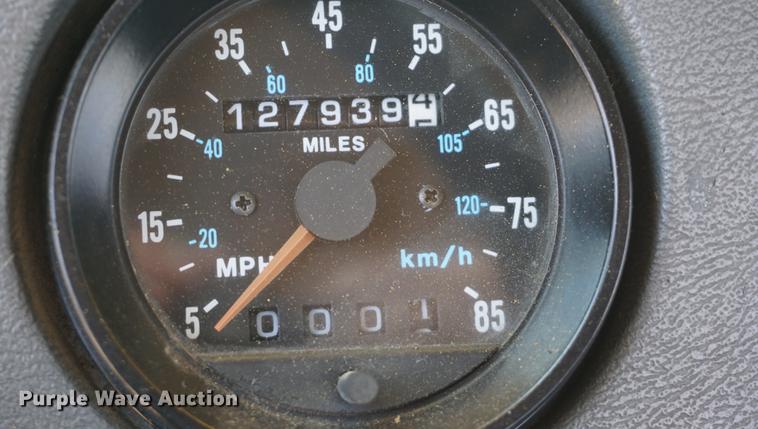 image for item DD7684 1998 Mack DM690S truck with Big John tree spade