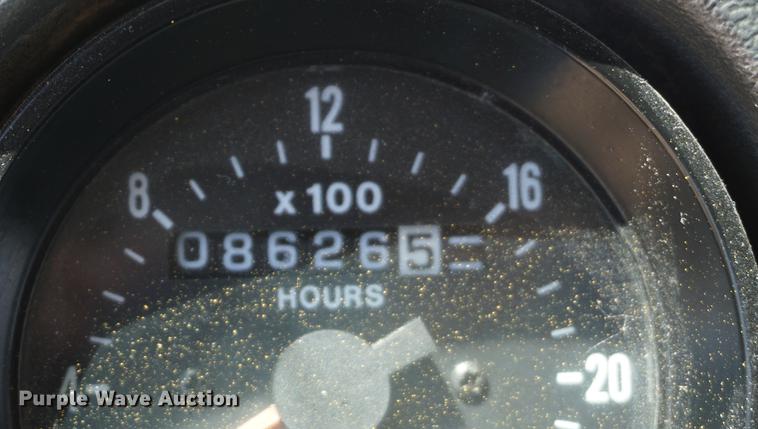 image for item DD7684 1998 Mack DM690S truck with Big John tree spade