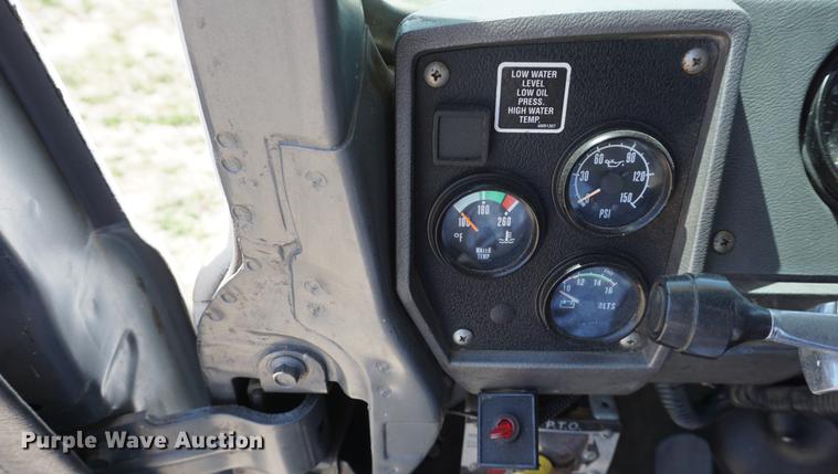 image for item DD7684 1998 Mack DM690S truck with Big John tree spade