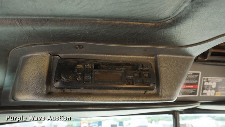 image for item DD7684 1998 Mack DM690S truck with Big John tree spade