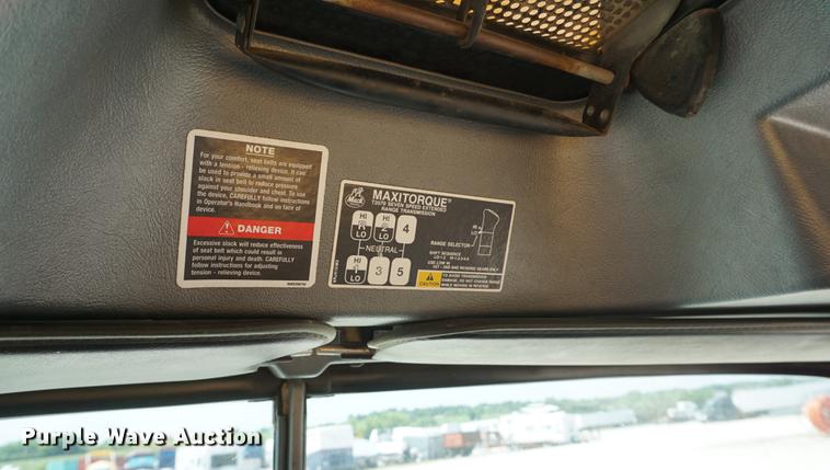 image for item DD7684 1998 Mack DM690S truck with Big John tree spade