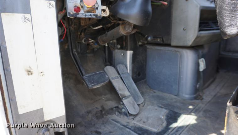 image for item DD7684 1998 Mack DM690S truck with Big John tree spade