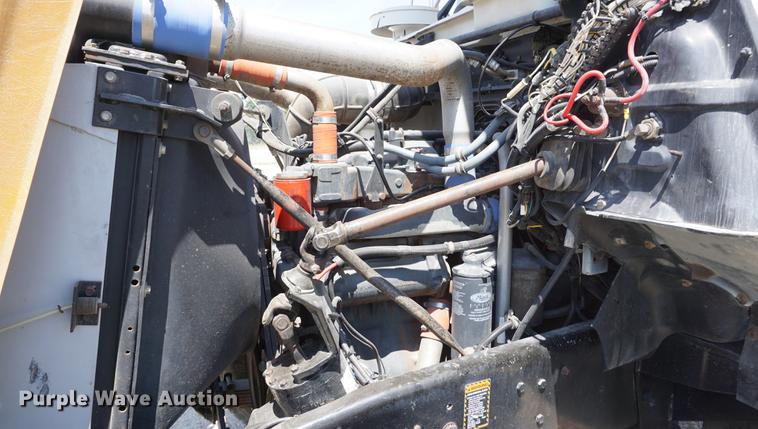 image for item DD7684 1998 Mack DM690S truck with Big John tree spade