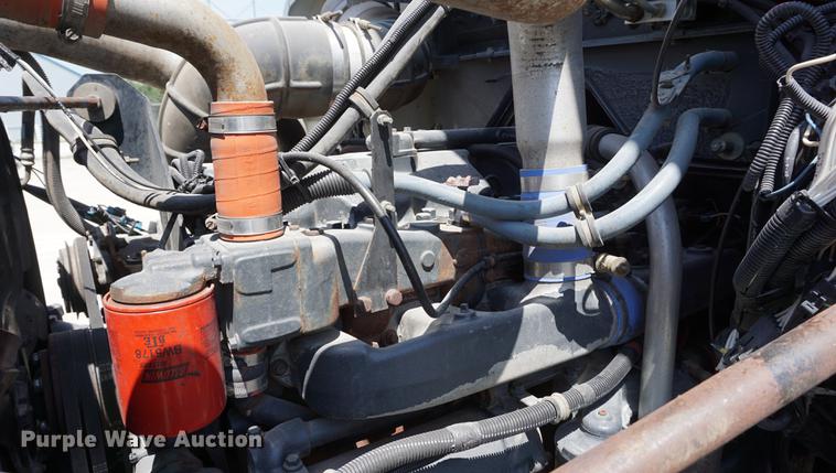 image for item DD7684 1998 Mack DM690S truck with Big John tree spade