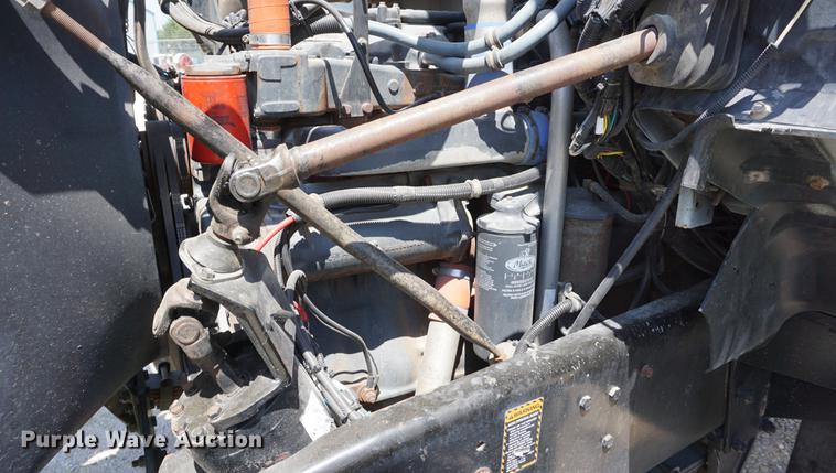 image for item DD7684 1998 Mack DM690S truck with Big John tree spade