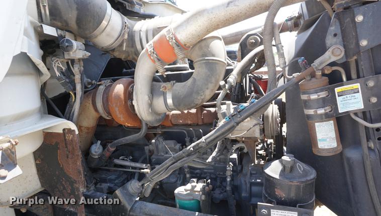 image for item DD7684 1998 Mack DM690S truck with Big John tree spade