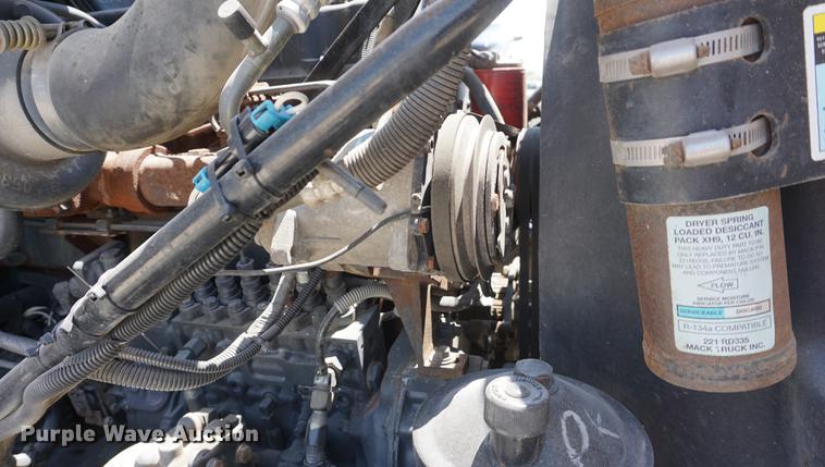 image for item DD7684 1998 Mack DM690S truck with Big John tree spade