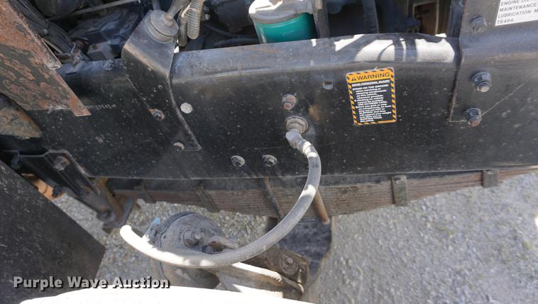 image for item DD7684 1998 Mack DM690S truck with Big John tree spade