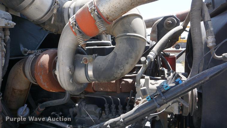 image for item DD7684 1998 Mack DM690S truck with Big John tree spade