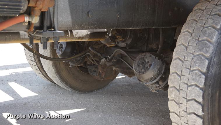 image for item DD7684 1998 Mack DM690S truck with Big John tree spade