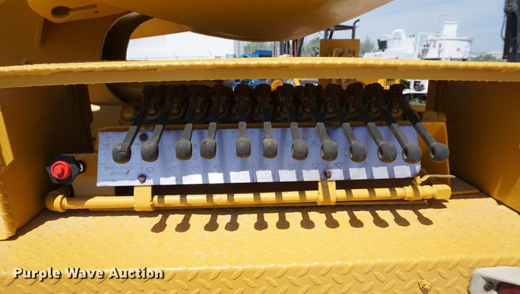 image for item DD7684 1998 Mack DM690S truck with Big John tree spade