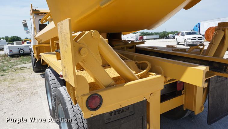 image for item DD7684 1998 Mack DM690S truck with Big John tree spade