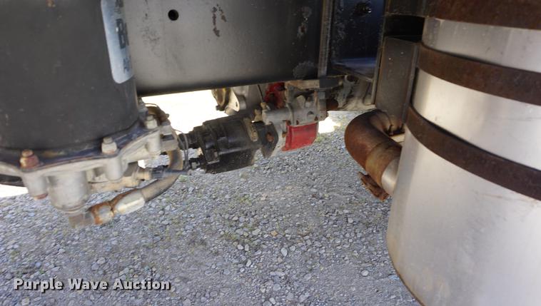 image for item DD7684 1998 Mack DM690S truck with Big John tree spade