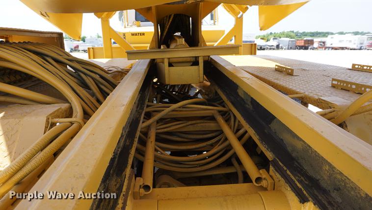 image for item DD7684 1998 Mack DM690S truck with Big John tree spade