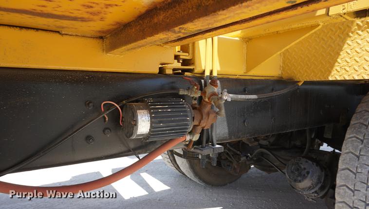 image for item DD7684 1998 Mack DM690S truck with Big John tree spade