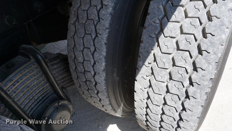 image for item DD7684 1998 Mack DM690S truck with Big John tree spade