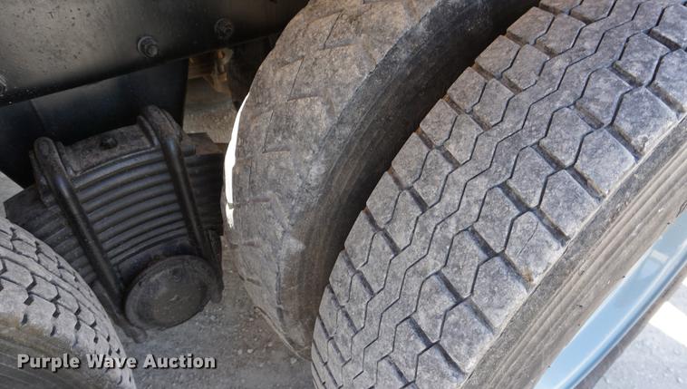 image for item DD7684 1998 Mack DM690S truck with Big John tree spade