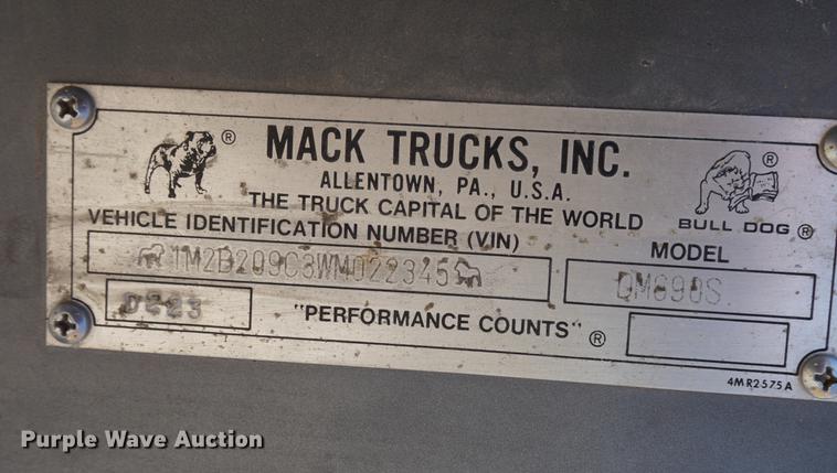 image for item DD7684 1998 Mack DM690S truck with Big John tree spade
