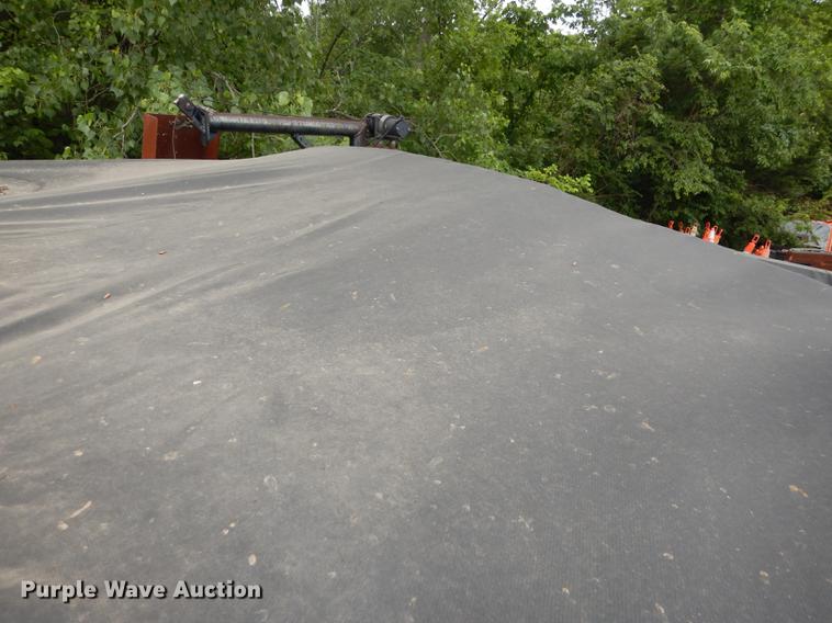 image for item DE1758 1984 Ford F700 flatbed truck with pot hole patcher