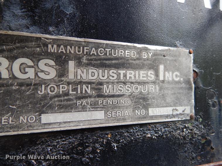 image for item DE1758 1984 Ford F700 flatbed truck with pot hole patcher