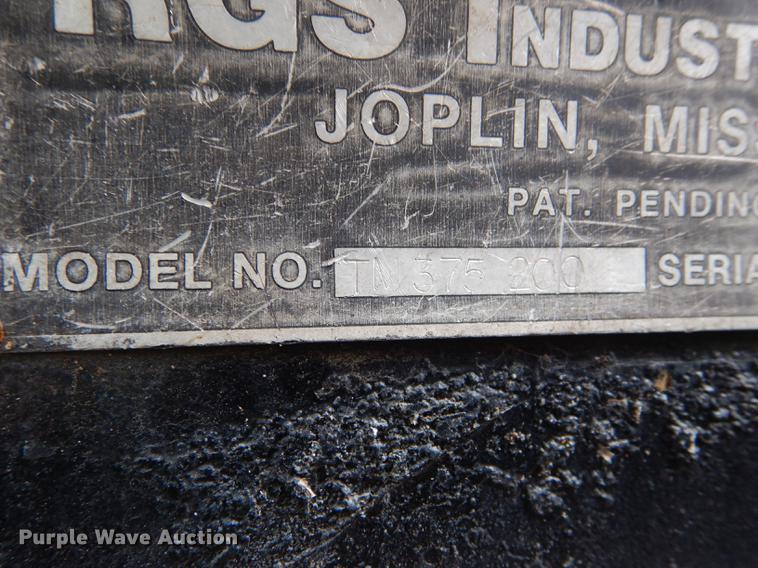 image for item DE1758 1984 Ford F700 flatbed truck with pot hole patcher