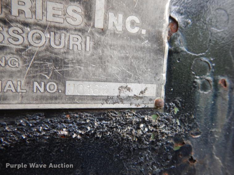 image for item DE1758 1984 Ford F700 flatbed truck with pot hole patcher