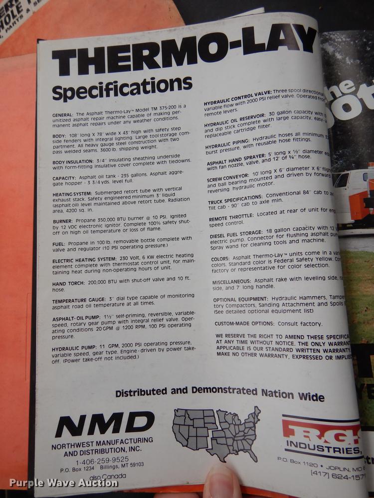 image for item DE1758 1984 Ford F700 flatbed truck with pot hole patcher