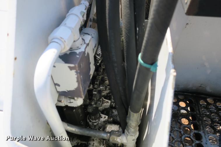 image for item DE3706 1996 Bombardier GT1600NTLFD Go-Tract track carrier with digger derrick