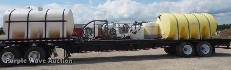 image for item DB6050 2002 Wade Services drop deck tank trailer