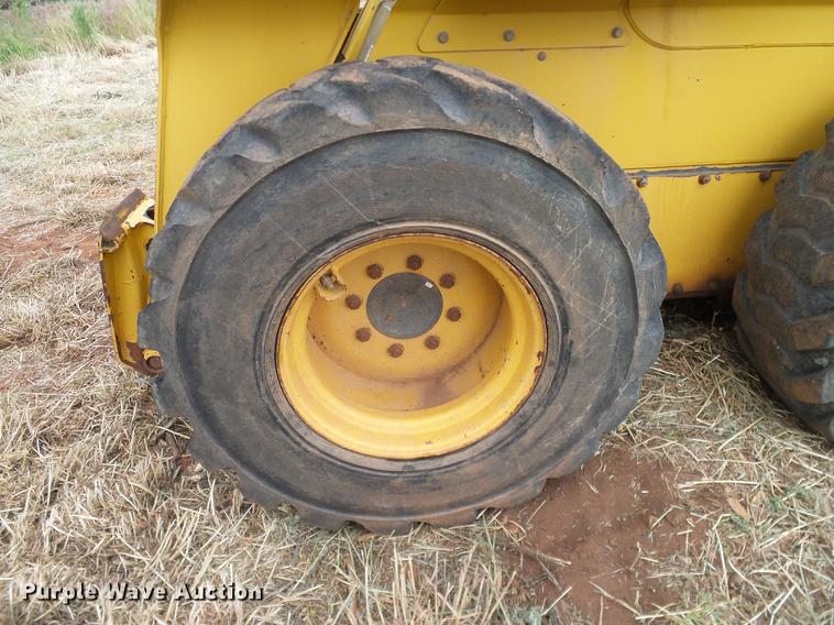 image for item DD8181 2000 John Deere 260 skid steer