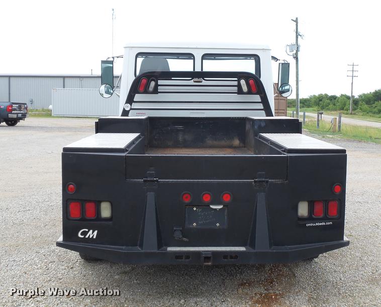 image for item DB7114 2004 Freightliner FL70 flatbed truck