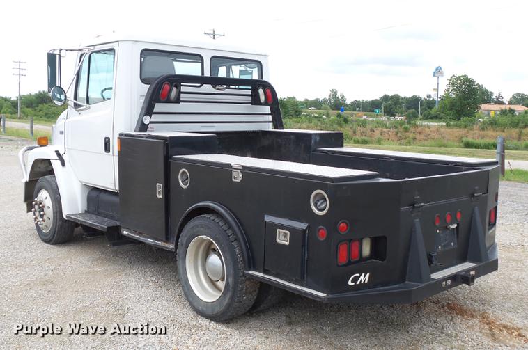 image for item DB7114 2004 Freightliner FL70 flatbed truck