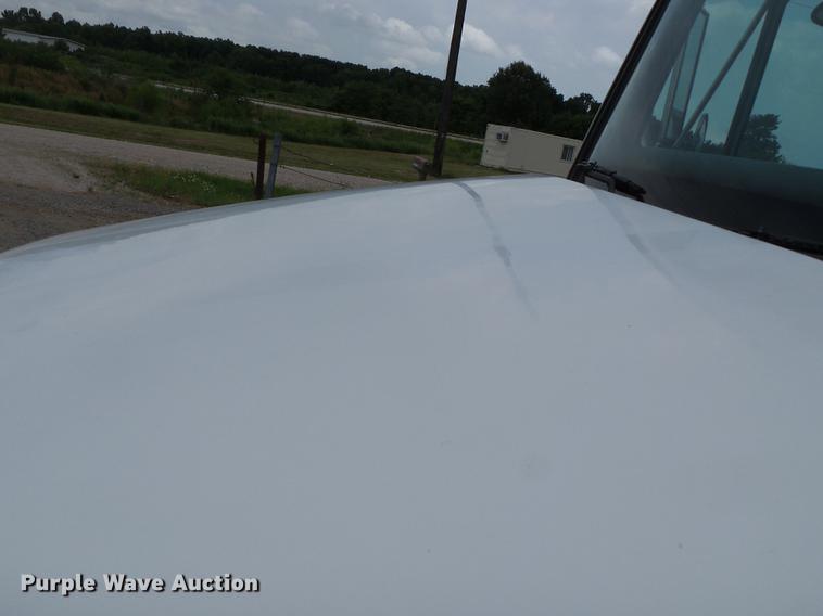 image for item DB7114 2004 Freightliner FL70 flatbed truck