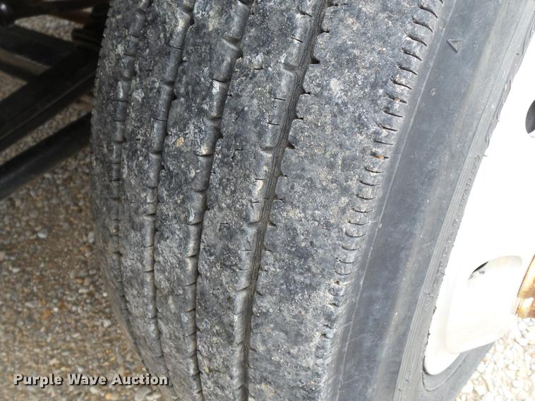 image for item DB7114 2004 Freightliner FL70 flatbed truck